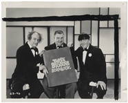 Moe Howard's ''Three Stooges Scrapbook'' & 2 Photos of the Stooges Holding Up one of the Scrapbooks on Their Show -- 17.5'' x 24.5'' Empty Book Has Moe's Name Stamped at Lower Right -- Damage to Spine